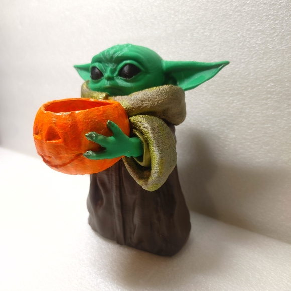 Star Wars Other - Green Baby Yoda Figurine Holding Orange Pumpkin